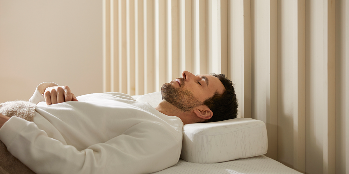 Restful sleep on a Kanuda's ergonomic pillow designed by a physical therapist